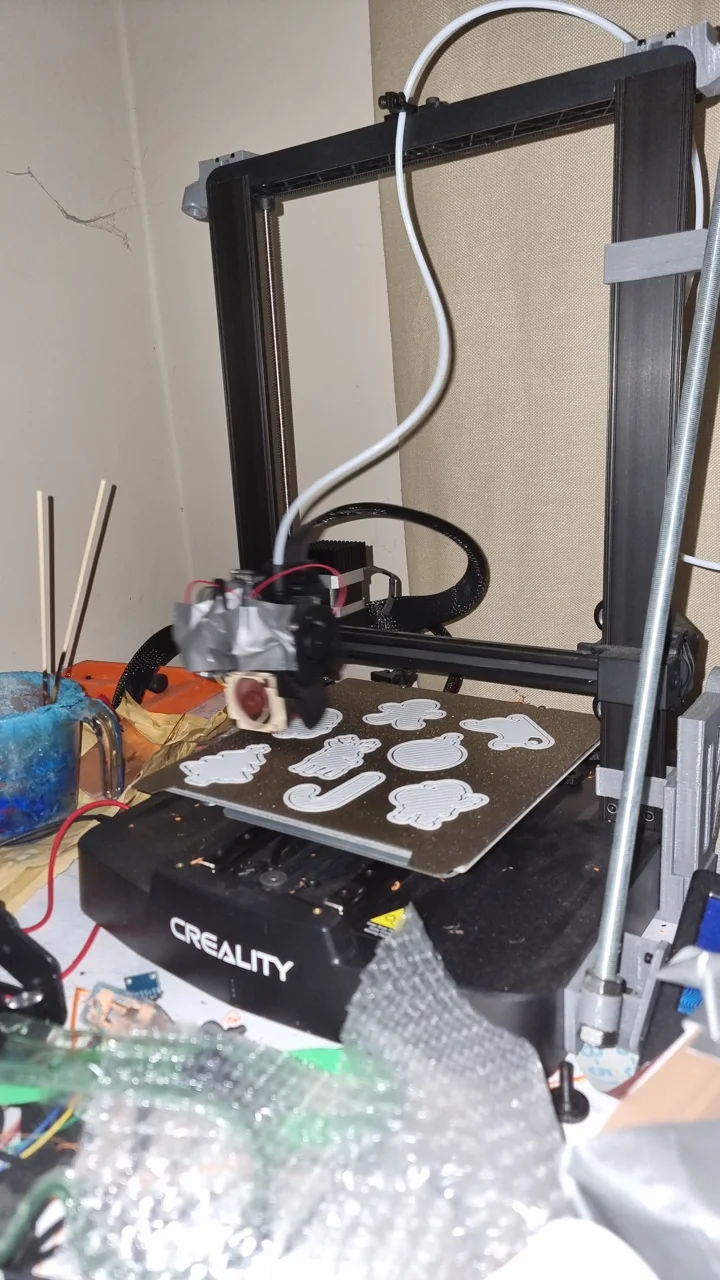 My modified Ender 3 V3 SE printing a batch of parts