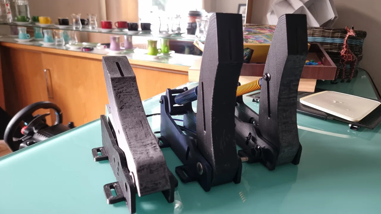 The assembled set of three printed sim racing pedals