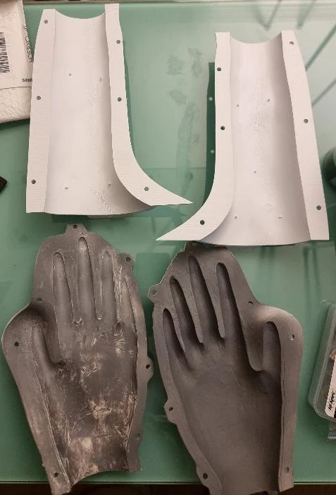 Printed forearm moulds and cast components on the workbench